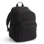 Black quilted backpack on a white background